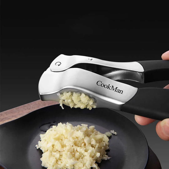 Stainless Steel Precision: Kitchen Garlic Press - Your Essential Manual Garlic Masher and Vegetable Chopping Tool econXpress